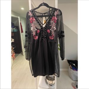 Black dress with floral and mesh details
